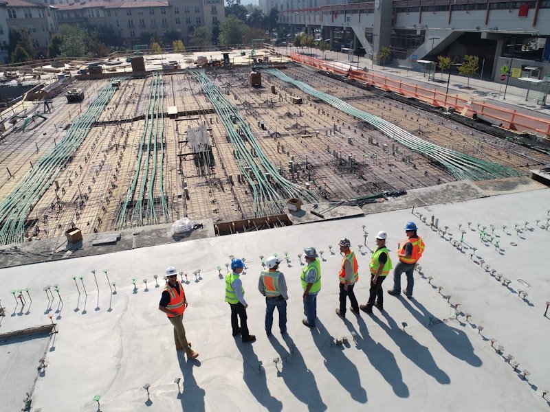 Construction crew on a Vancouver work site coordinating bin placement